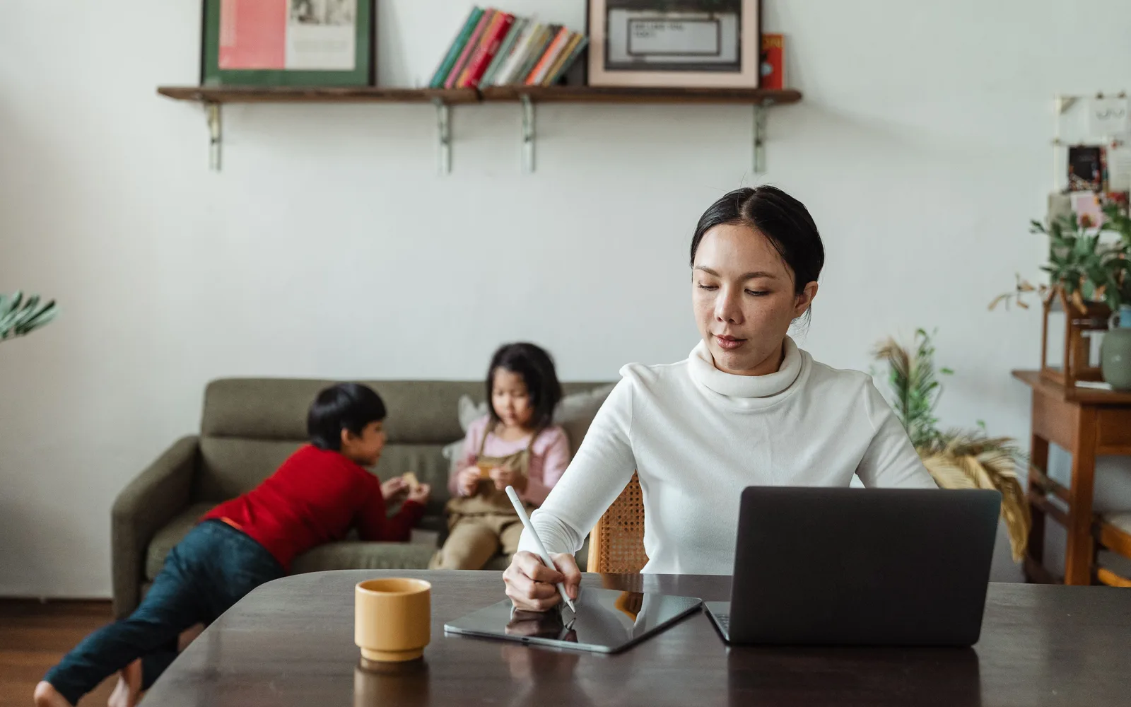 Family using IPTV-compatible devices in a living room