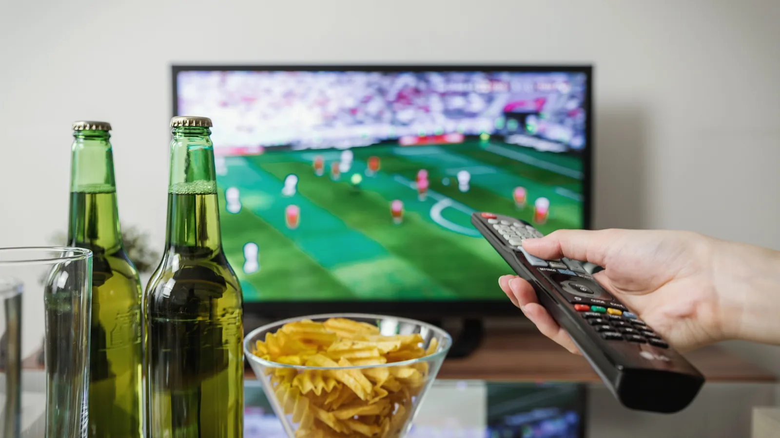 Live football playing on a television through an IPTV service